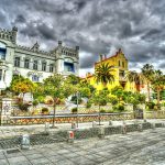 View of Kavala, Greece with colorful houses and medieval fortress