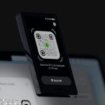 "OneKey Pro hardware wallet with 1.3-inch touchscreen and titanium casing"