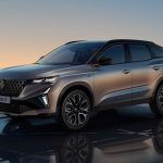 Renault Austral SUV front and side view on the road